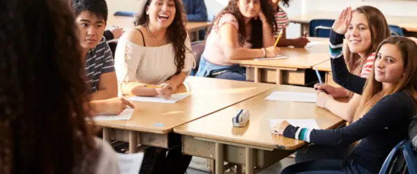 A teacher looking out to her classroom of students