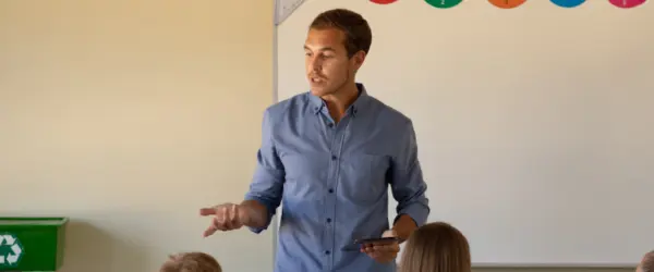 A teacher in a classroom of students