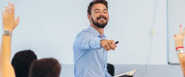 A teacher choosing a student to answer a question